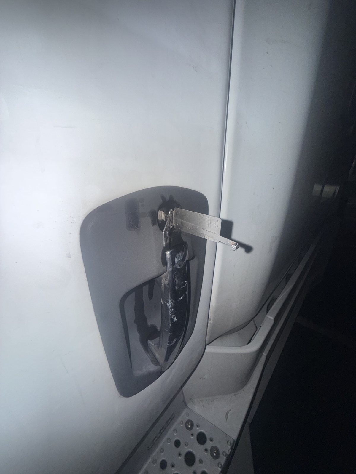 Lishi in the door lock of a Freightliner during a night lockout in Taylor by City Locksmith Taylor