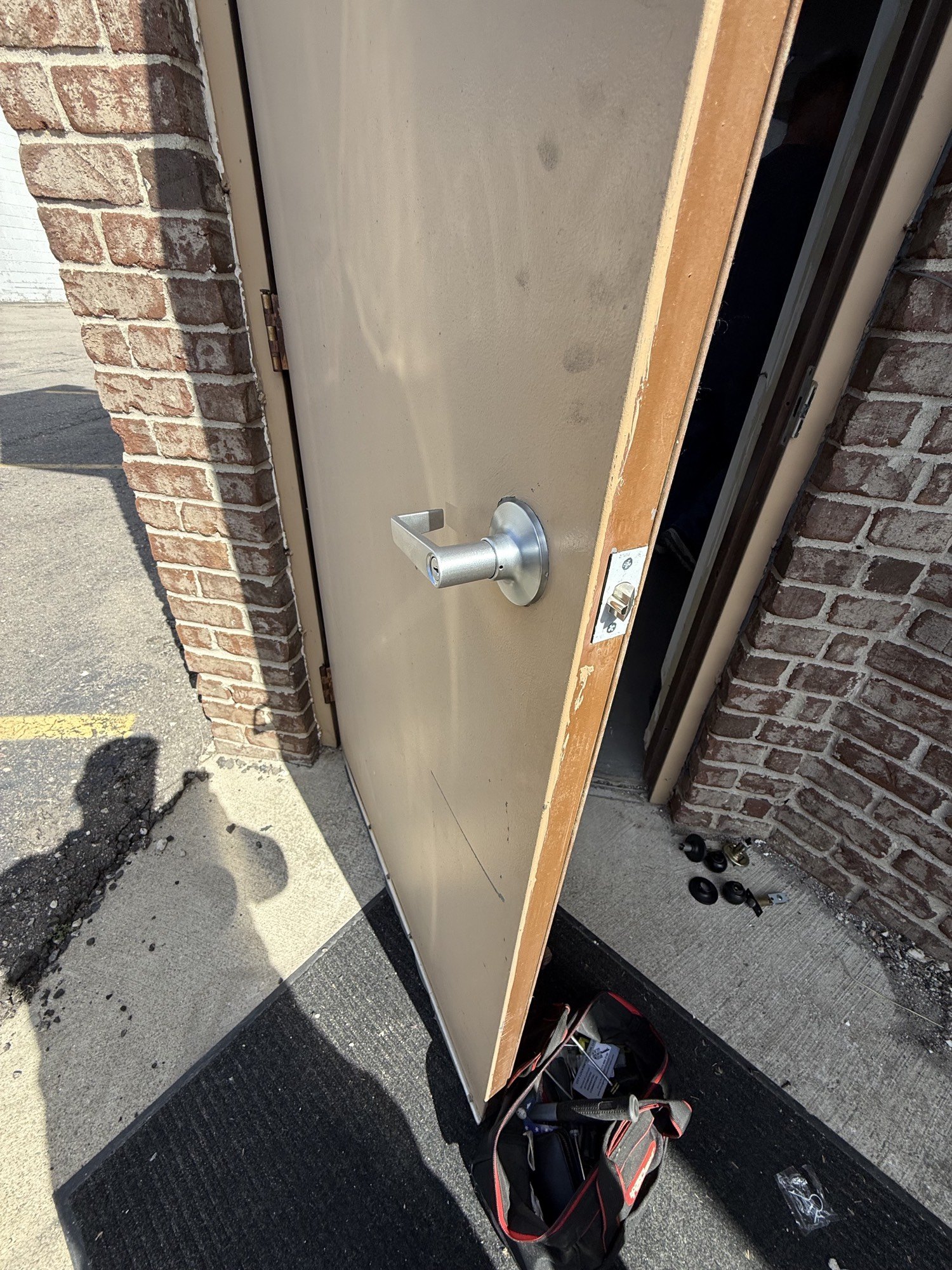 New commercial lever installed and rekeyed in Lincoln Park by City Locksmith Taylor
