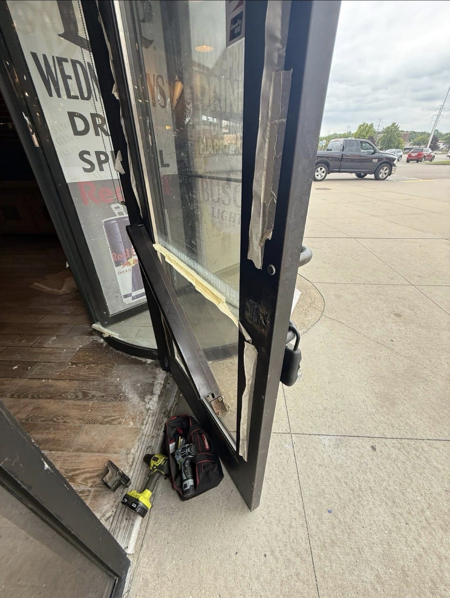 Panic bar install on a commercial aluminum storefront door in Monroe by City Locksmith Taylor