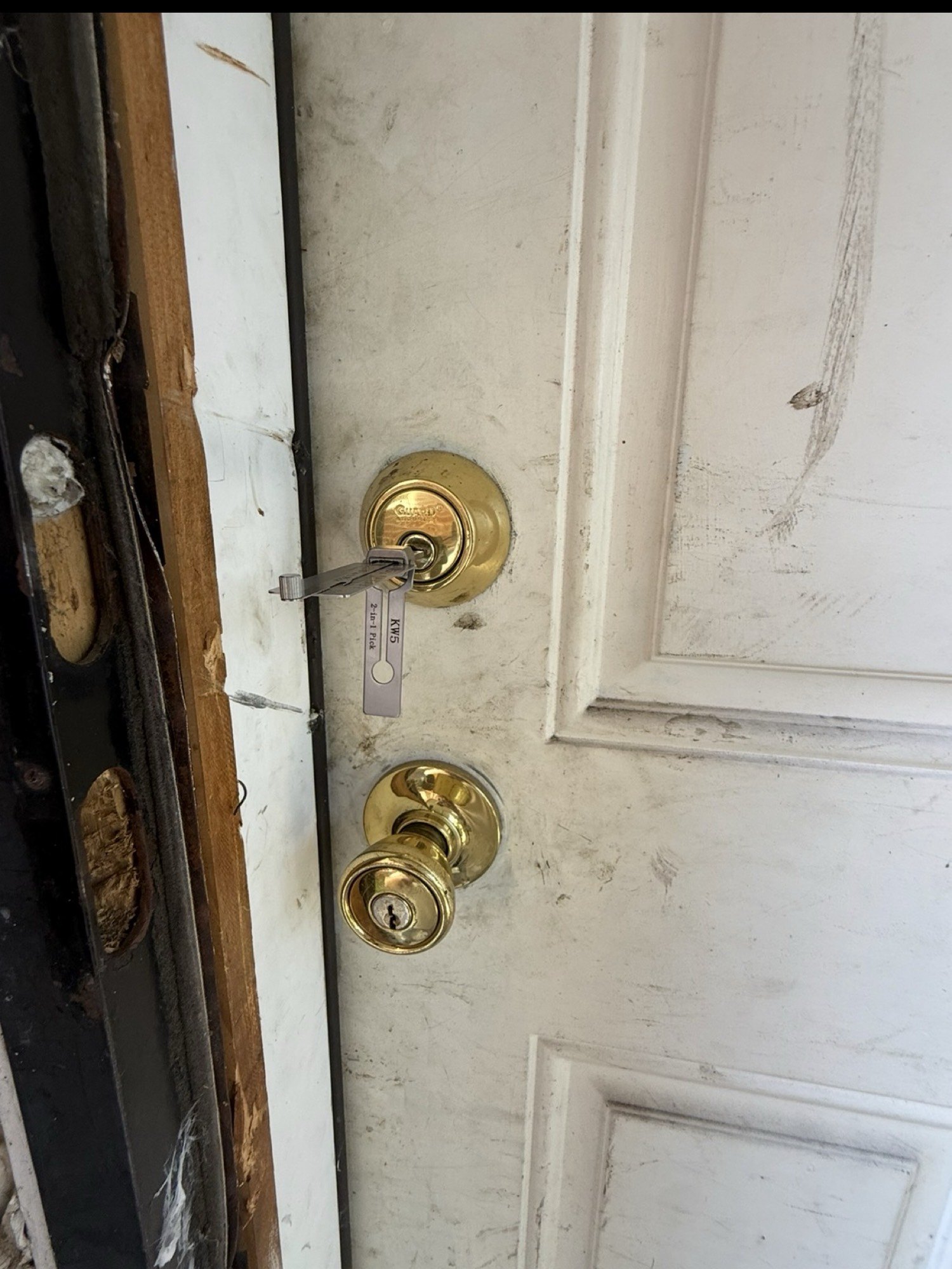 Residential deadbolt being opened during a house lockout by City Locksmith Taylor