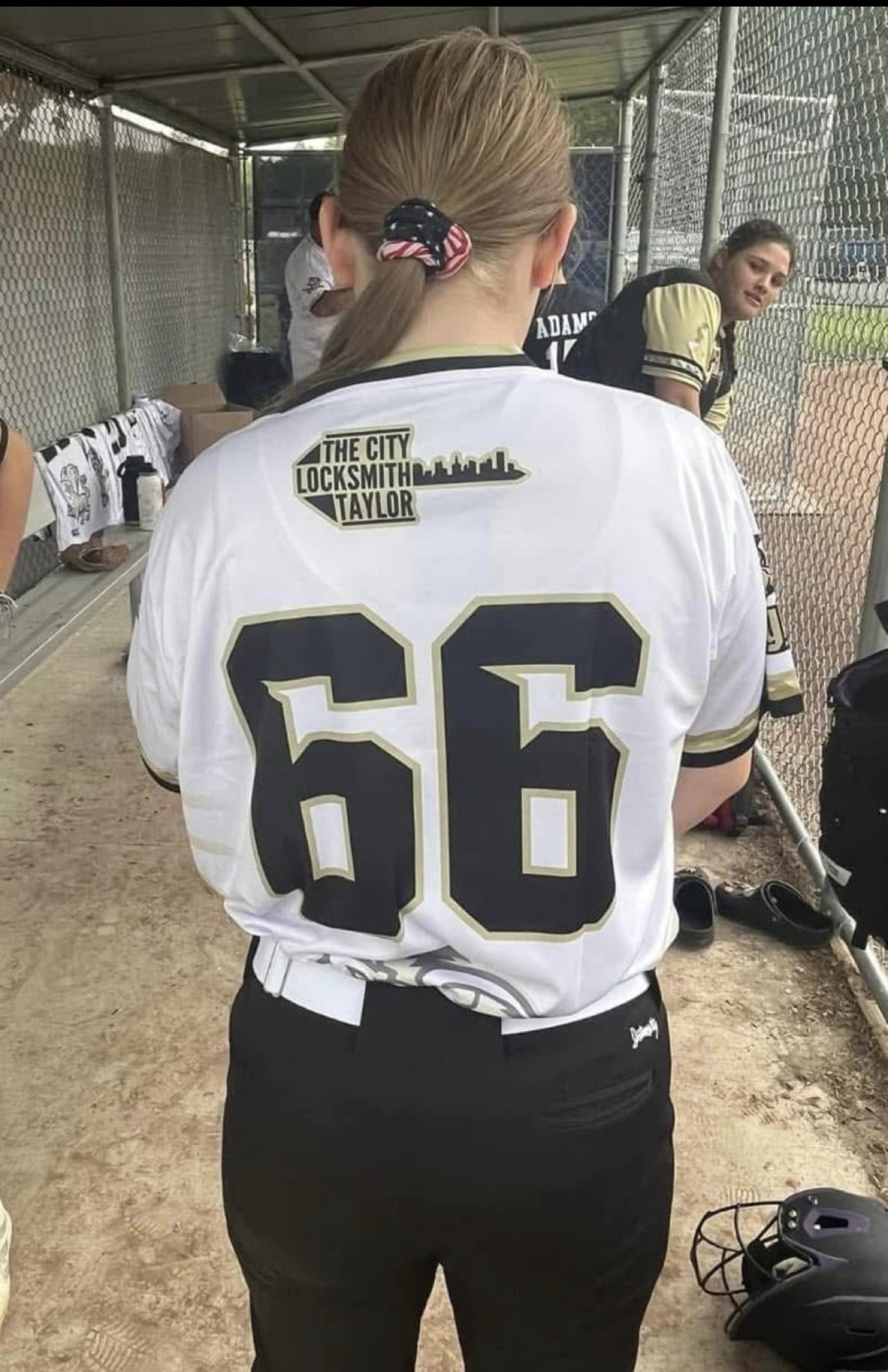Taylor North Little League softball jersey sponsored by The City Locksmith Taylor