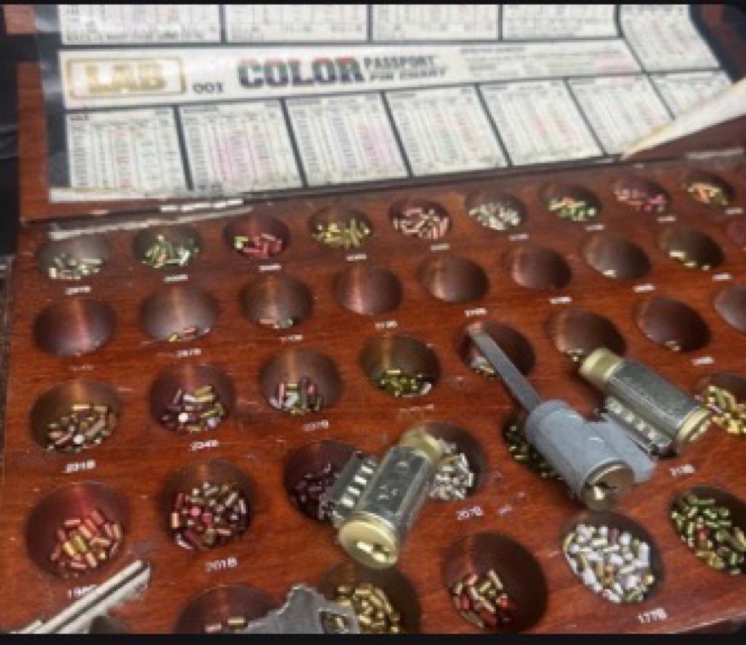 Pin kit and lock cylinders from a three-lock house rekey in Wyandotte by City Locksmith Taylor